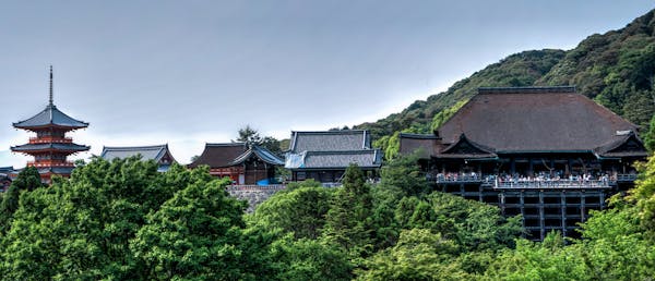 Photo by Pixabay A breathtaking view of the Kiyomizu-Dera Temple surrounded by lush greenery in Kyoto, Japan.